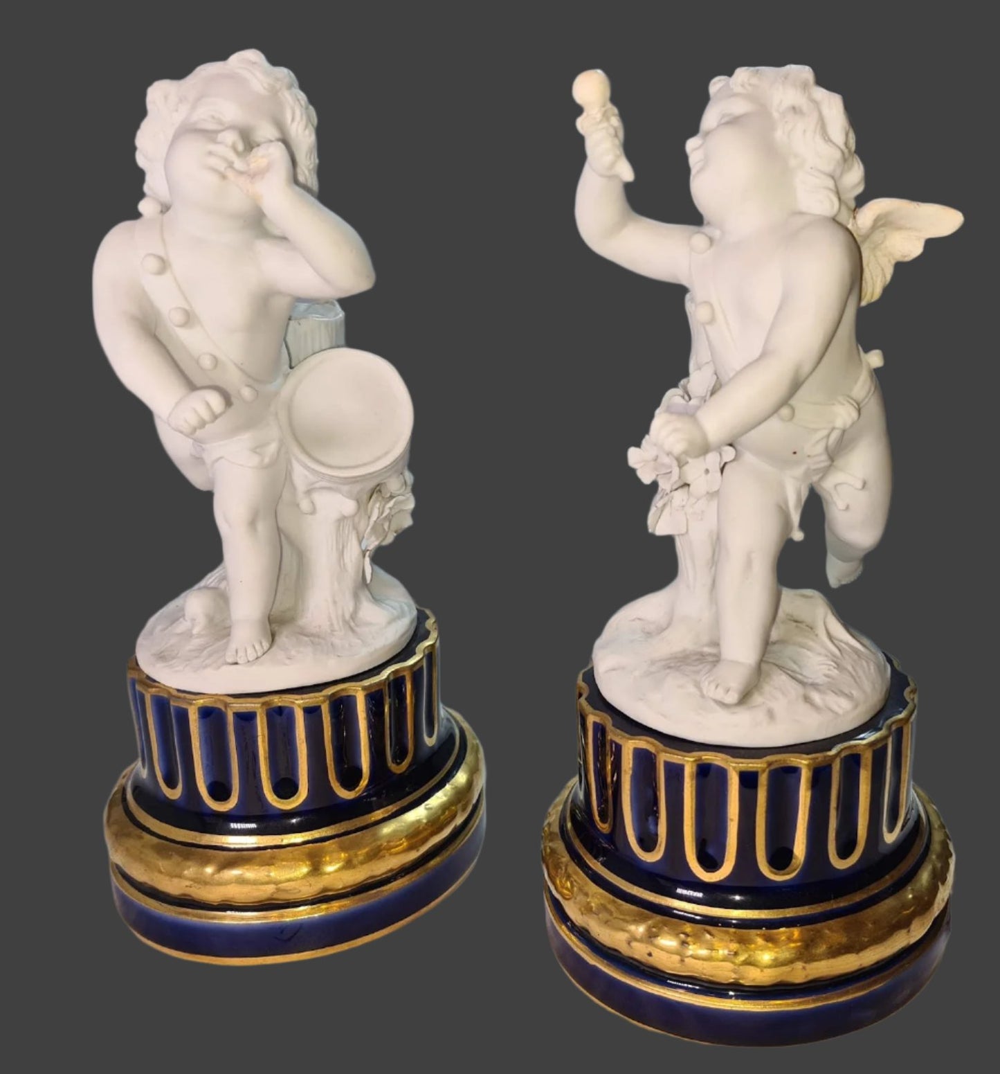 A Beautiful Pair Of Sevres Biscuit Porcelain Cherubim, On Cobalt Porcelain Plinths, 1776