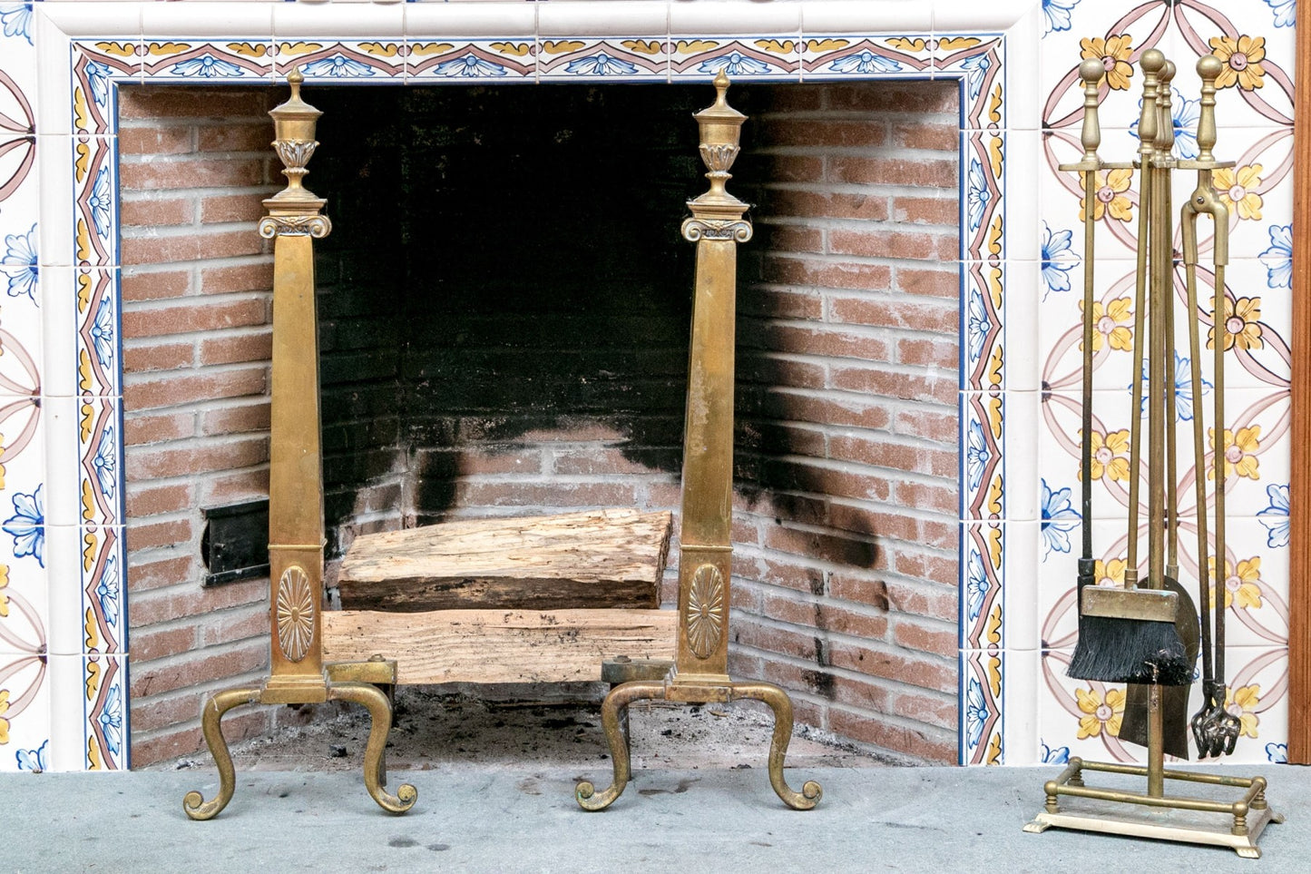 A wonderful collection of antique brass fireplace accessories