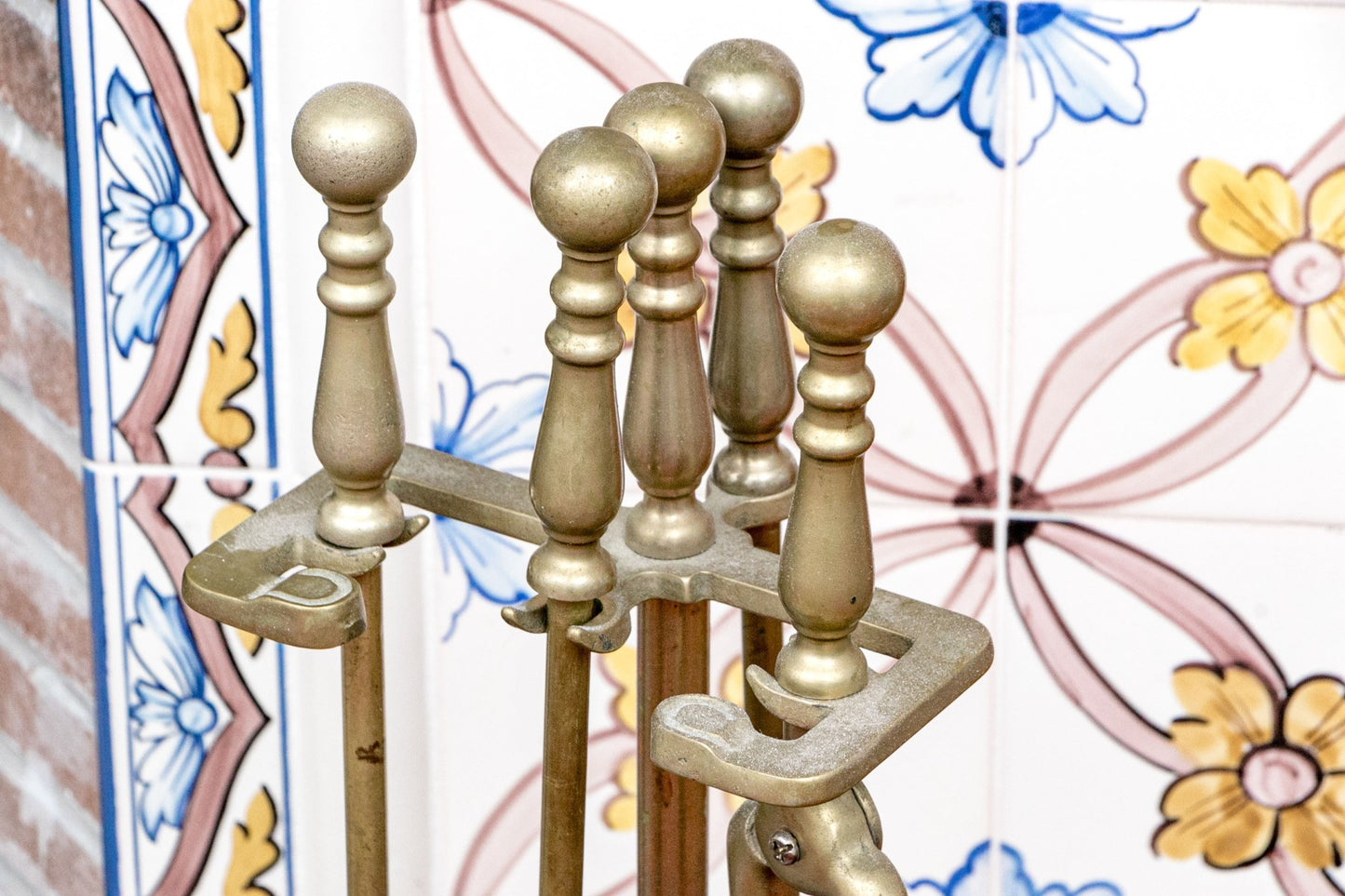 A wonderful collection of antique brass fireplace accessories