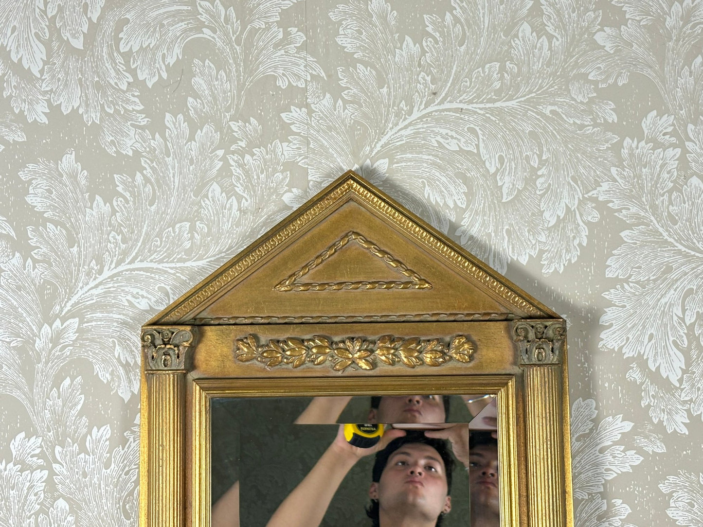 A Gilt Framed Mirror With Fluted Column Motif