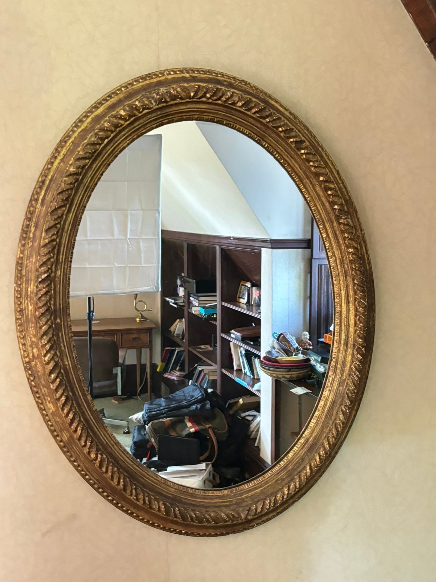 A Vintage Oval Gilt Framed Mirror