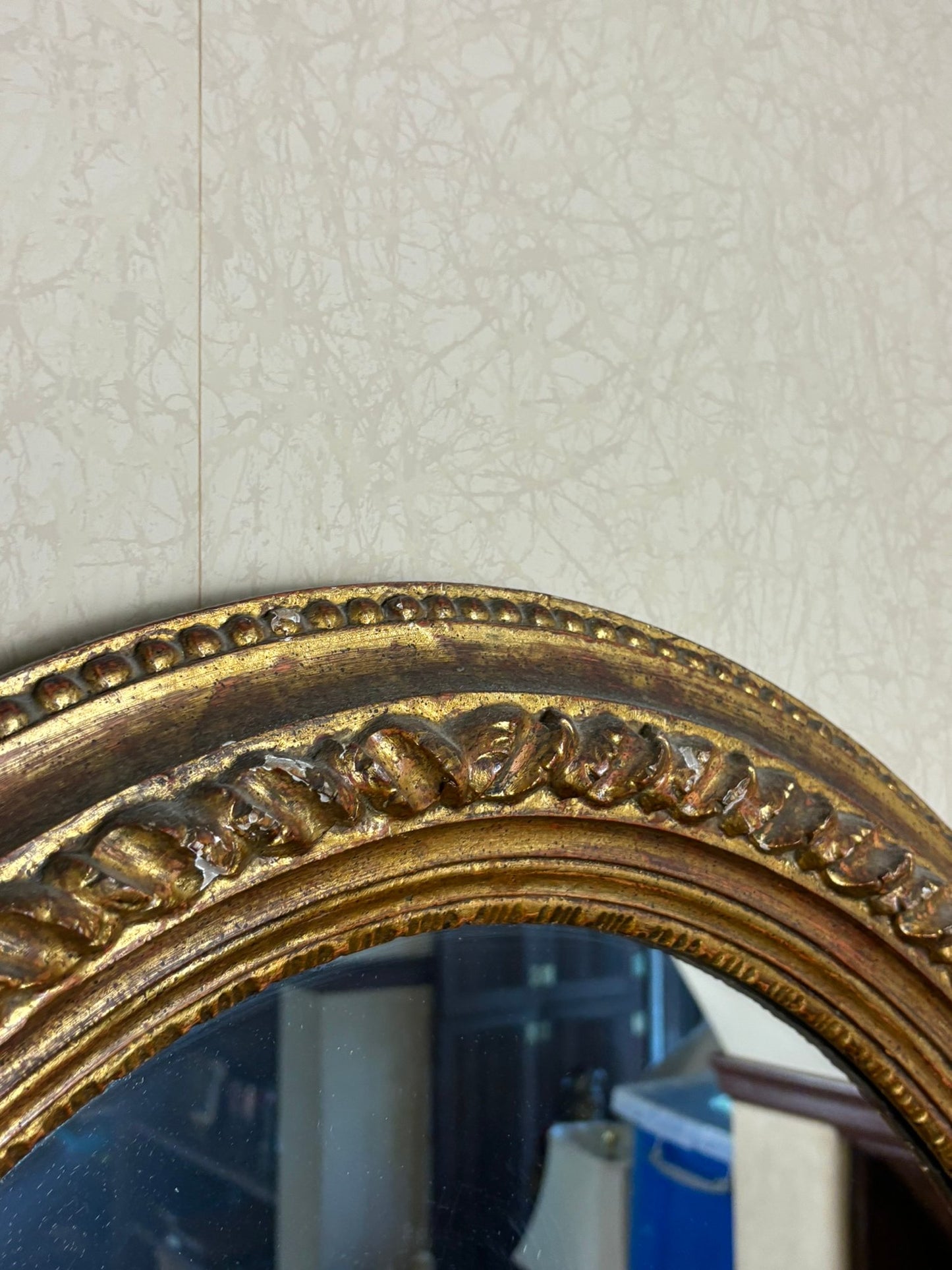 A Vintage Oval Gilt Framed Mirror