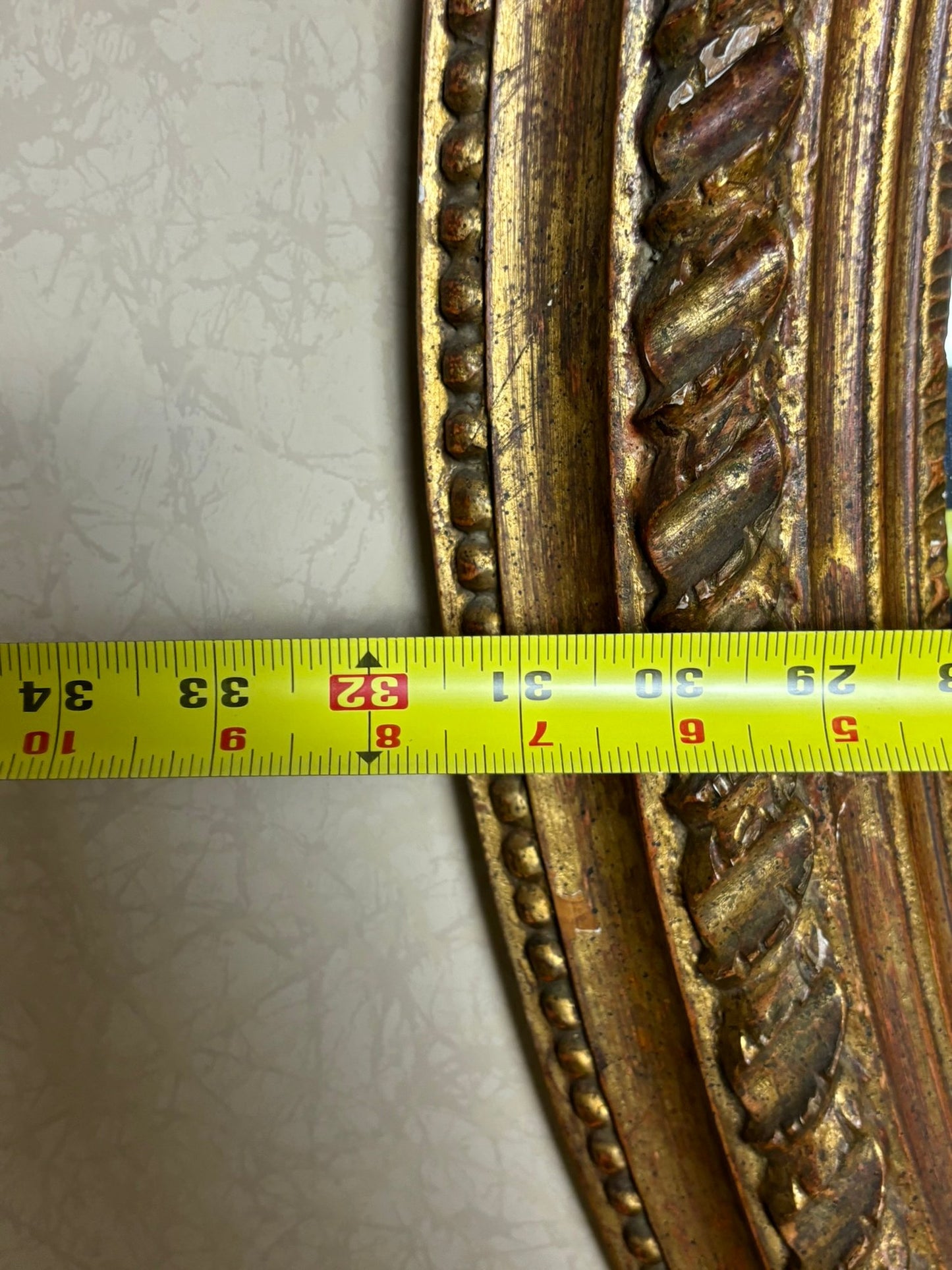 A Vintage Oval Gilt Framed Mirror