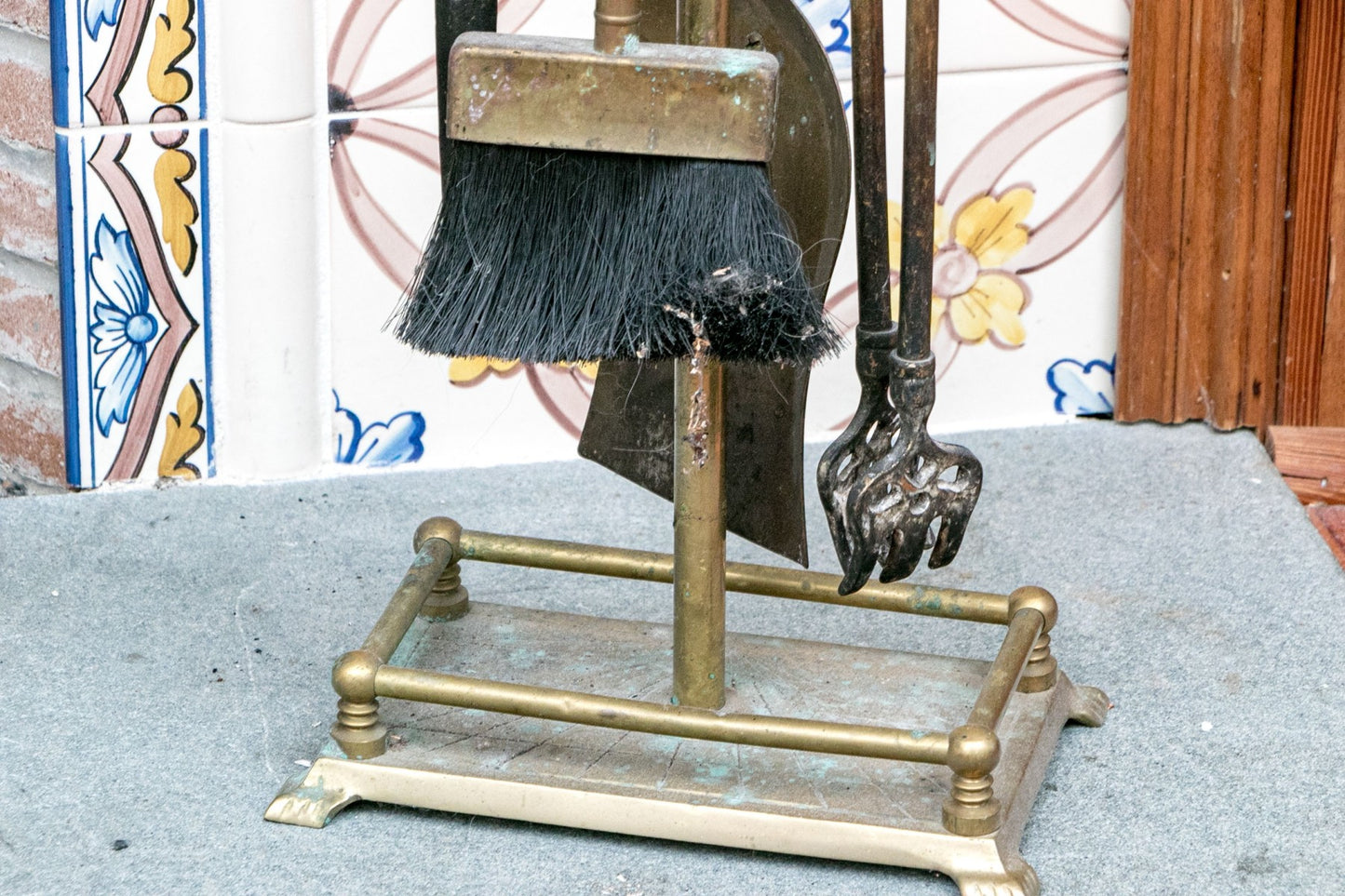 A wonderful collection of antique brass fireplace accessories