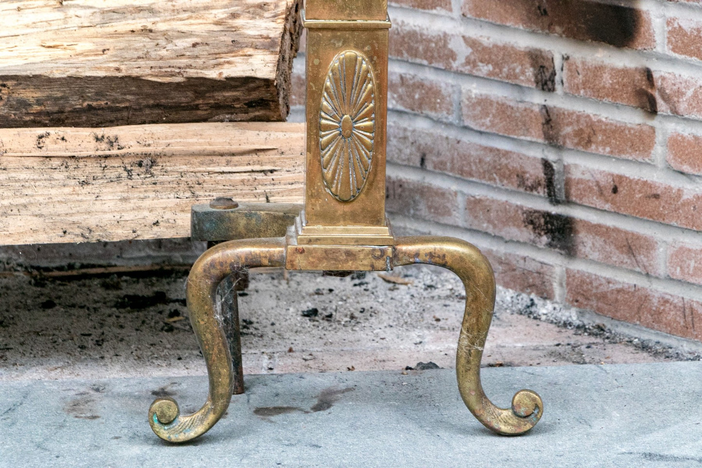 A wonderful collection of antique brass fireplace accessories