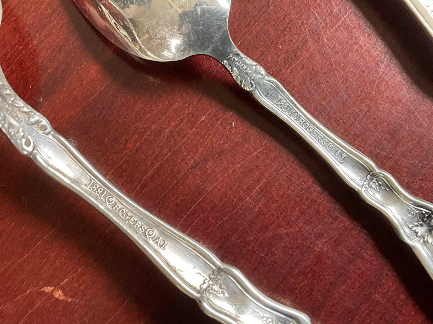 Assortment of Different Patterned Silver Plate Silverware (51 Pieces) in Box