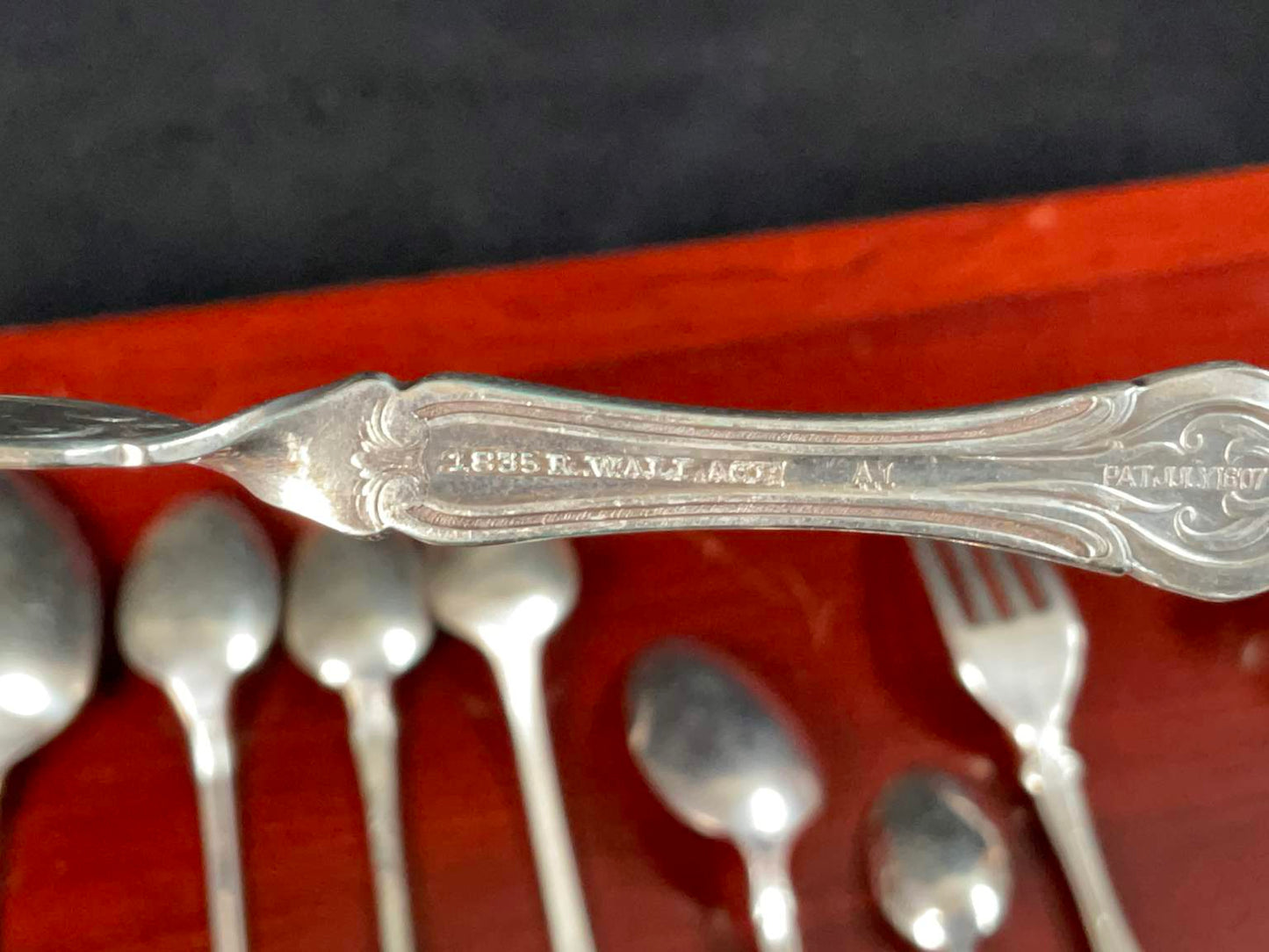 Assortment of Different Patterned Silver Plate Silverware (51 Pieces) in Box