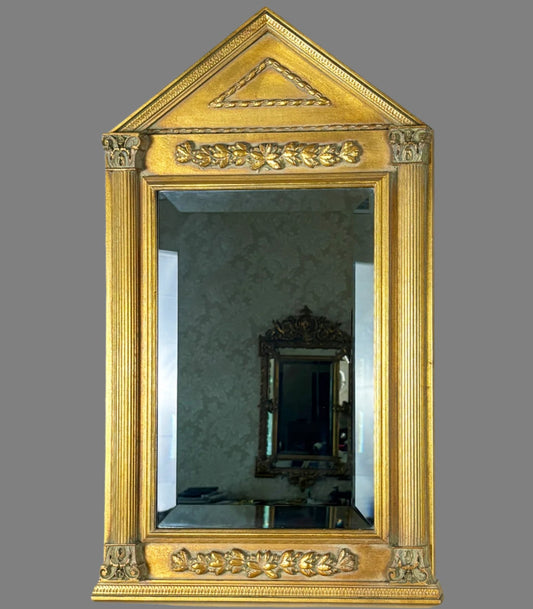 A Gilt Framed Mirror With Fluted Column Motif