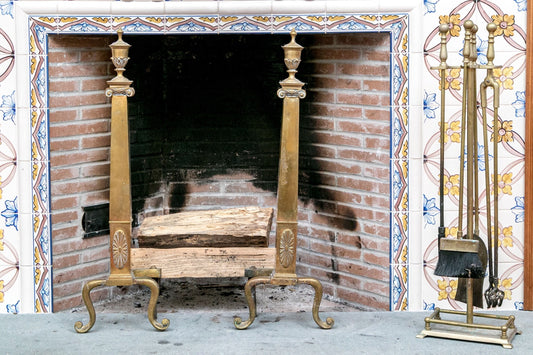 A wonderful collection of antique brass fireplace accessories