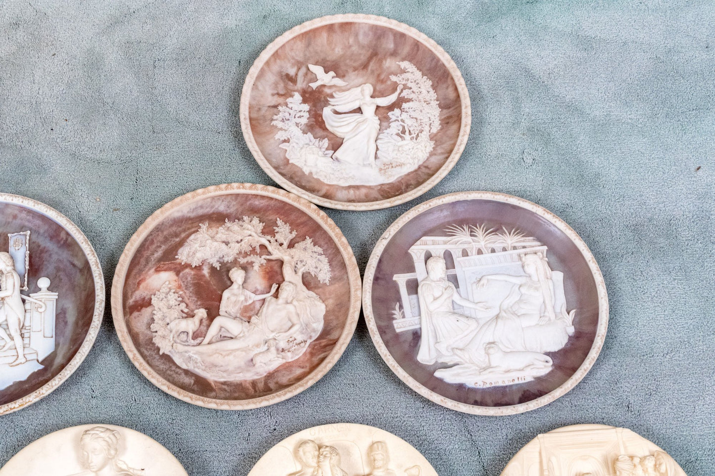 Unique Assembled Collection Of Fifteen Relief Decorated Ceramic Plates