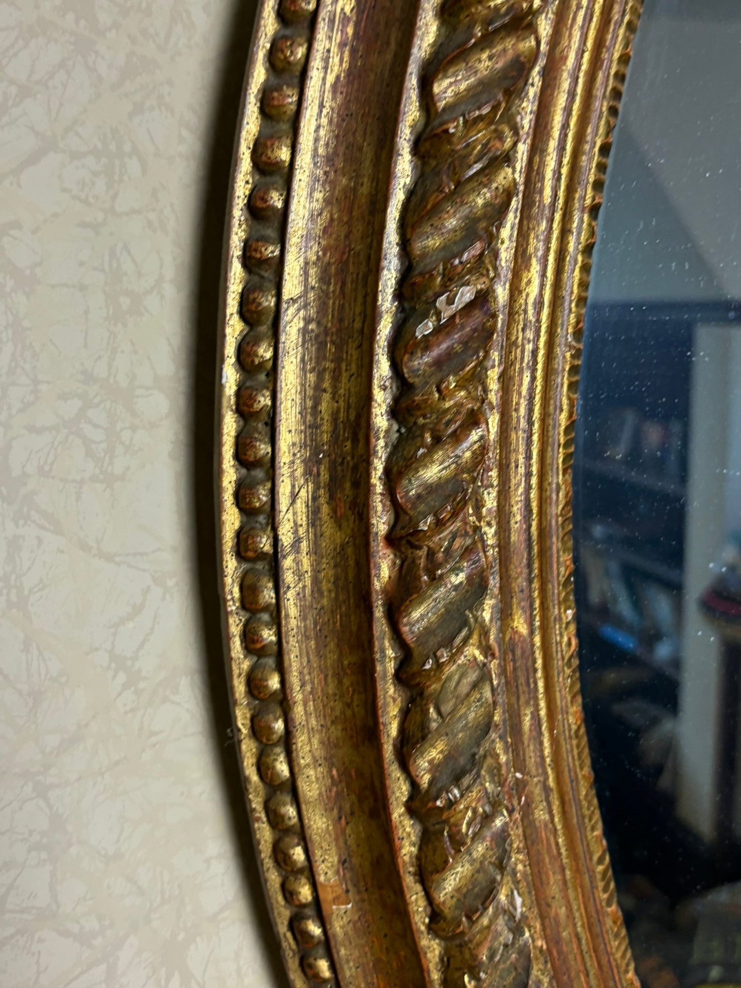 A Vintage Oval Gilt Framed Mirror