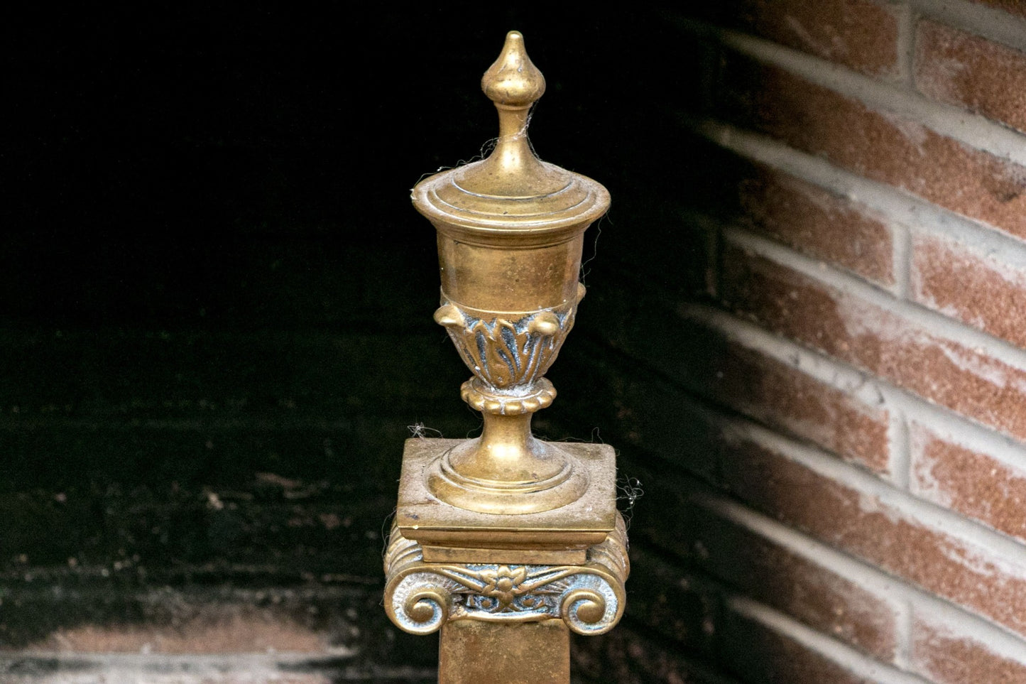 A wonderful collection of antique brass fireplace accessories