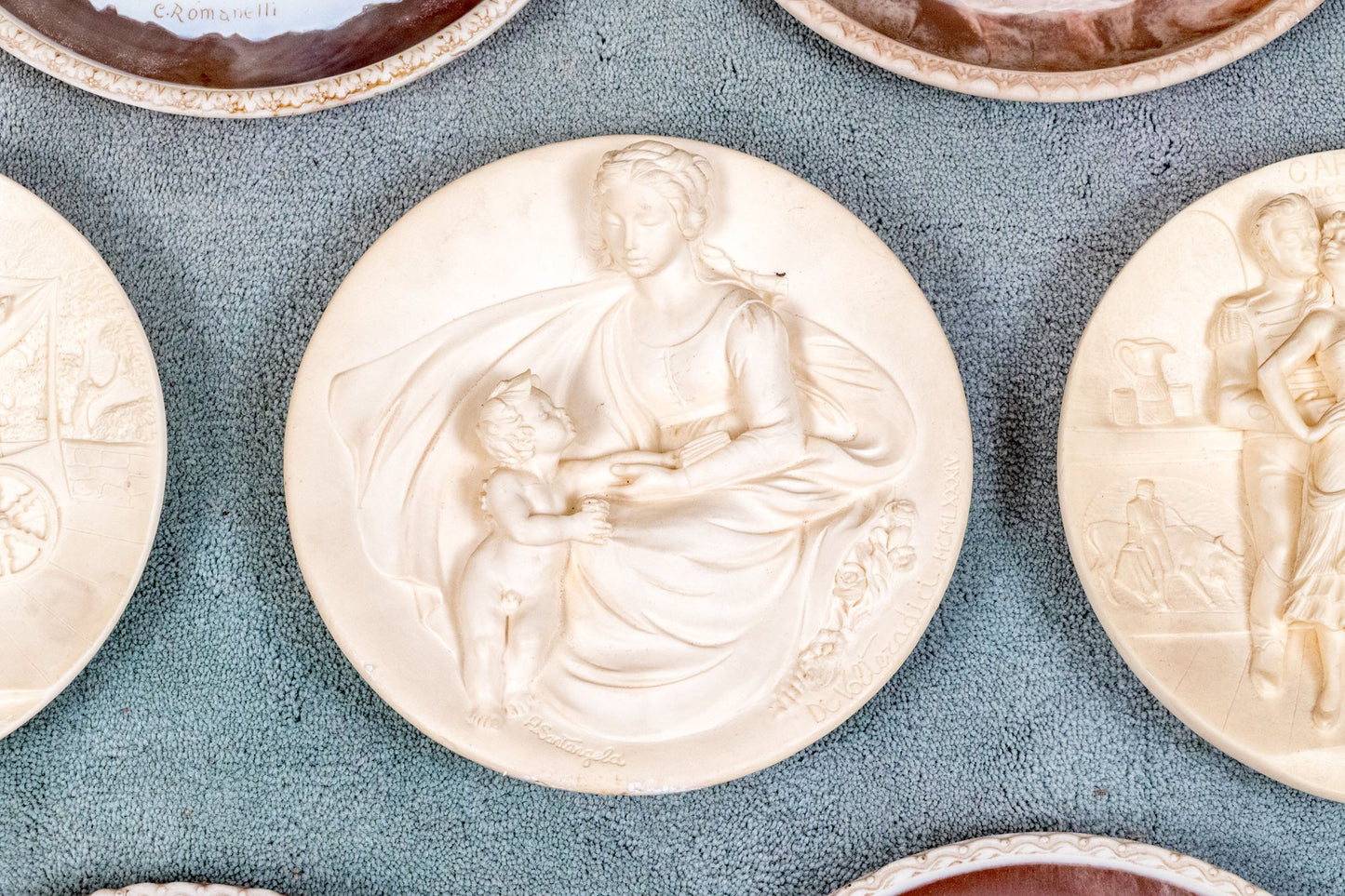 Unique Assembled Collection Of Fifteen Relief Decorated Ceramic Plates