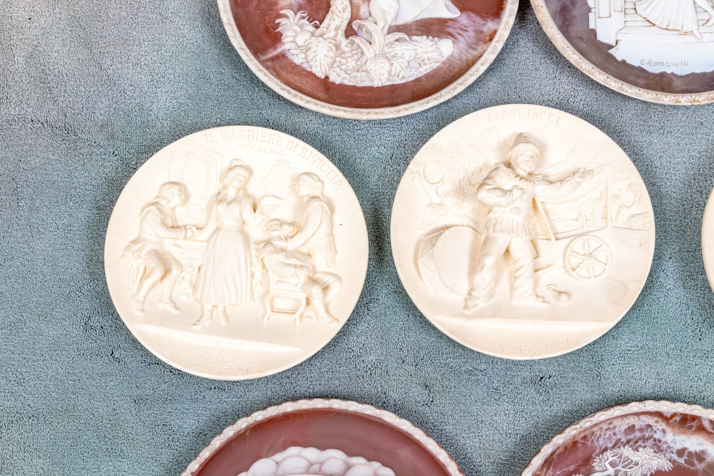 Unique Assembled Collection Of Fifteen Relief Decorated Ceramic Plates