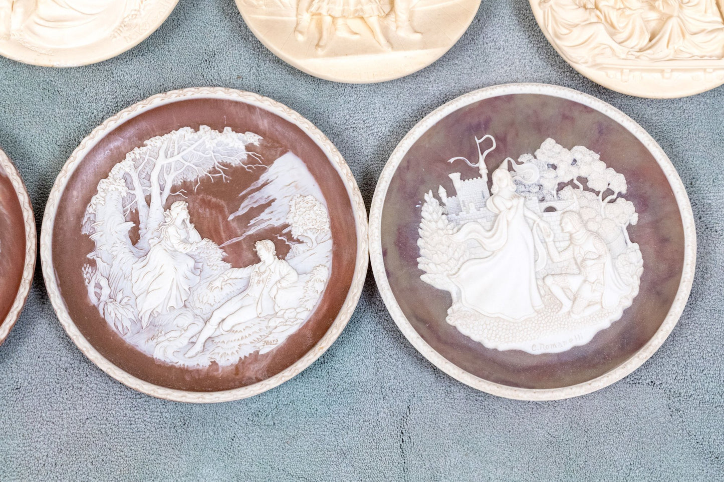 Unique Assembled Collection Of Fifteen Relief Decorated Ceramic Plates